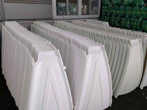 Flat-packed HDPE dome panels at the Wisdome House factory